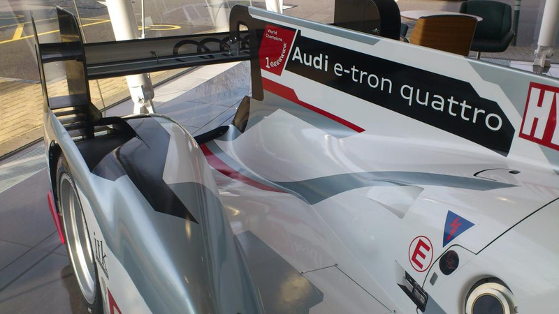 Illustration for article titled Audi R18 E-Tron (was) parked at Volkswagen Financial Services lobby